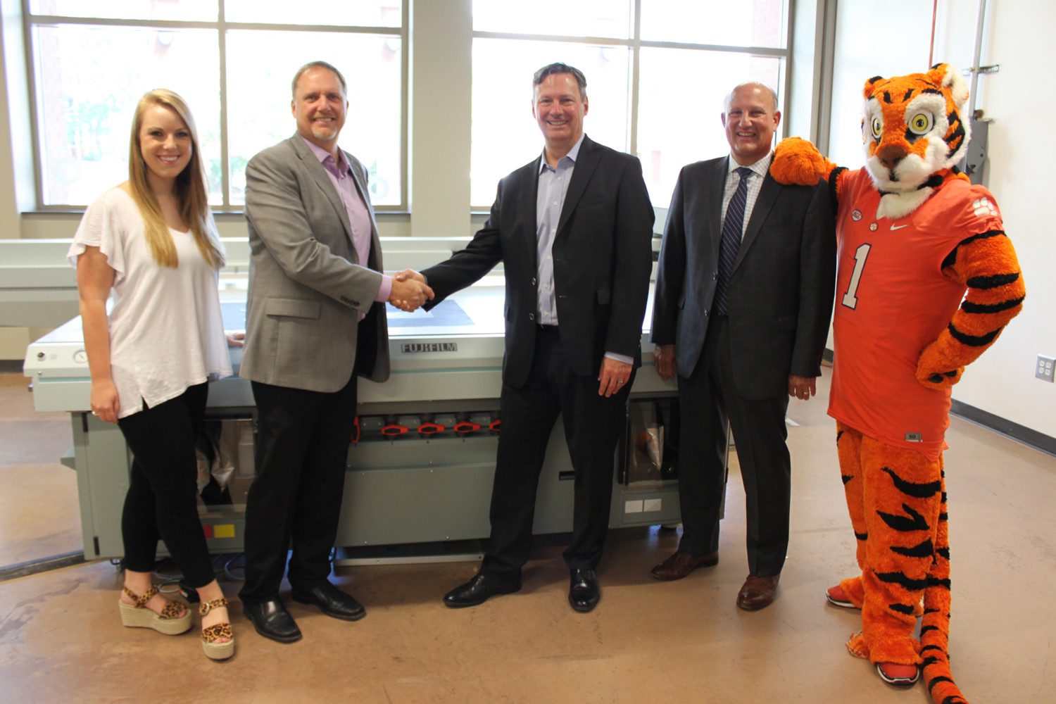 Clemson and Fuji employees pictured together in the Sonoco Institute Prototyping Lab