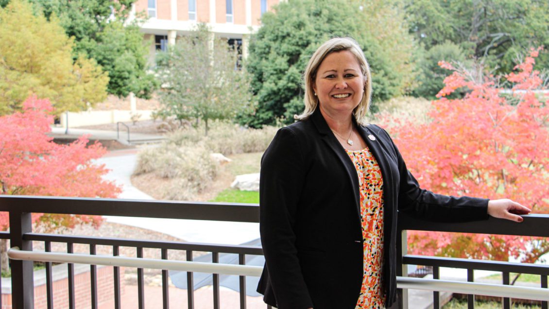 Kristin Walker-Donnelly, Student Affairs director of assessment, in the breezeway of Hendrix Student Center