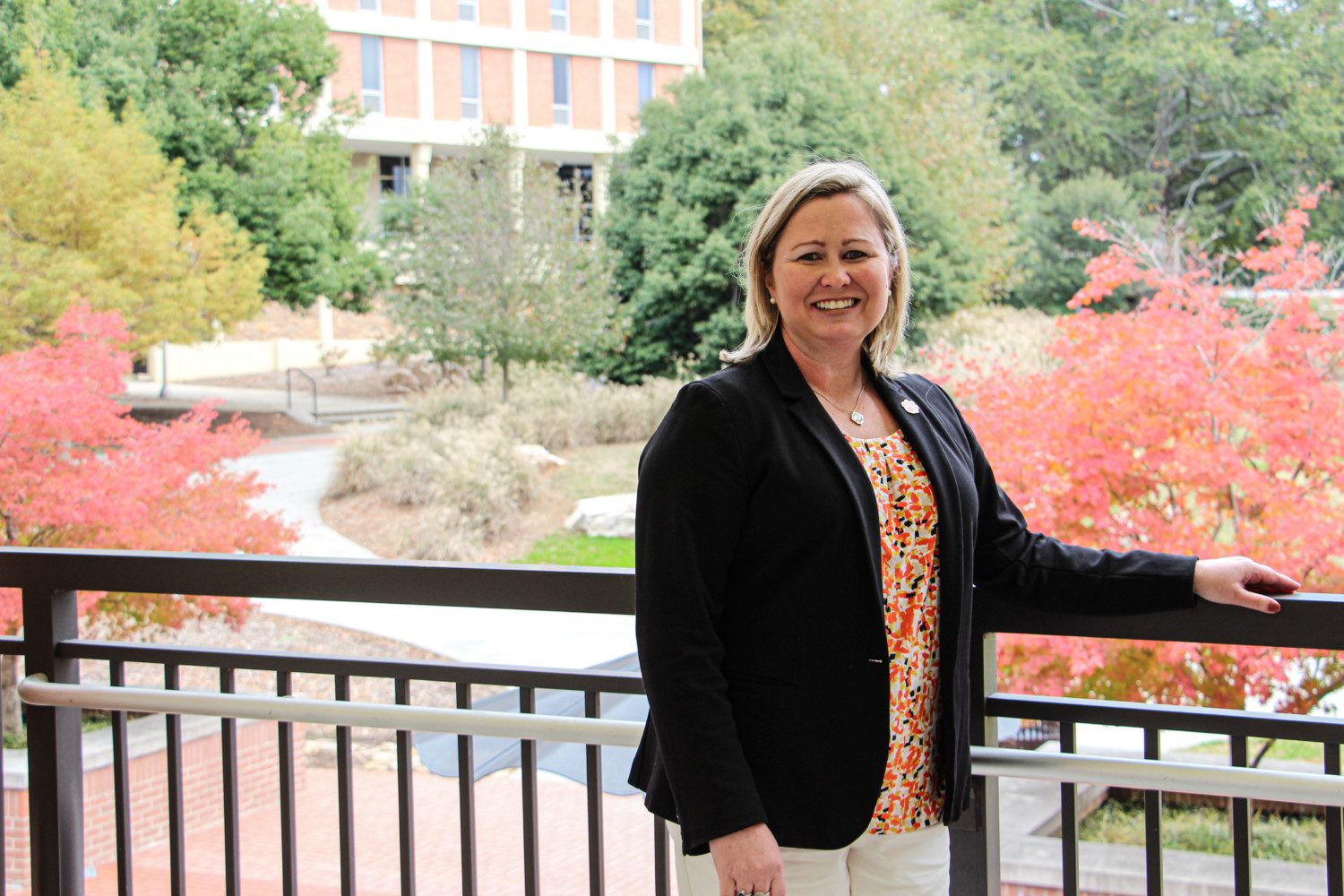 Kristin Walker-Donnelly, Student Affairs director of assessment, in the breezeway of Hendrix Student Center