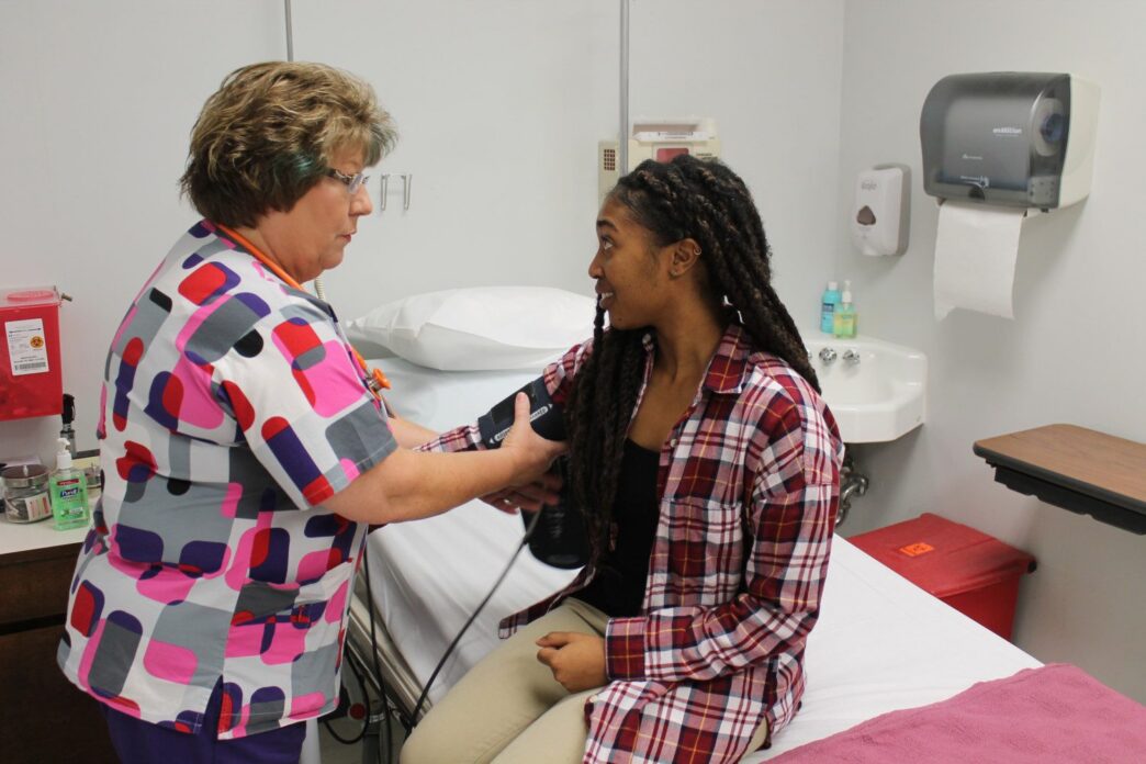 A student goes through a checkup at Redfern Health Center in 2017