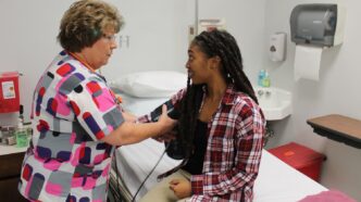 A student goes through a checkup at Redfern Health Center in 2017
