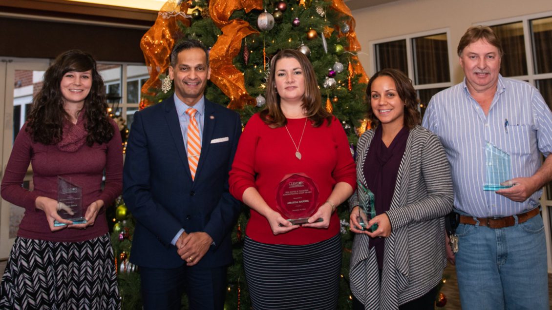 The 2019 staff award winners pose for a photo with Anand Gramopadhye, dean of the College of Engineering, Computing and Applied Sciences. Those pictured are (from left): Briana Peele, Gramopadhye, Amanda Harris, Monique Williams and Michael Justice.