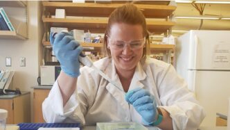 Heather Walters working in lab.