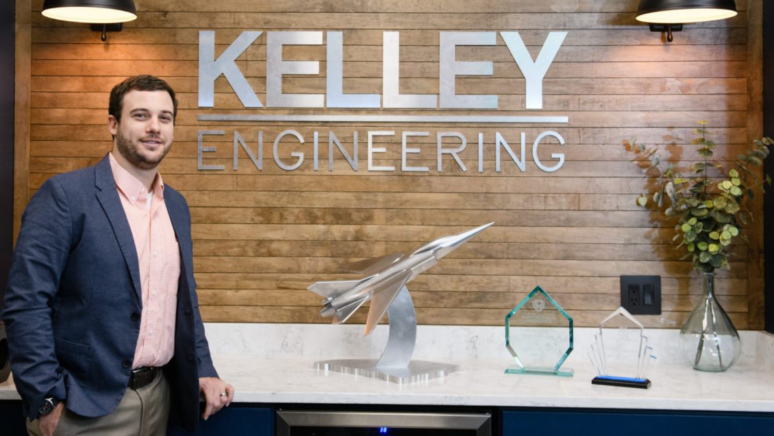 Matt Kelley of Kelley Engineering poses for a photo at Kelley Engineering. Recent awards are pictured.