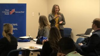 Bank executive talks to students