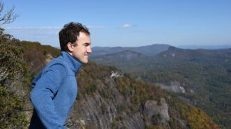 Timo Heister standing outside near mountain