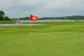 Flag blowing in wind on the Walker Golf Course