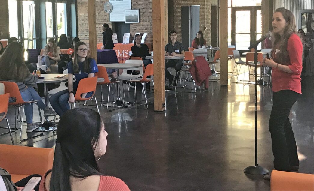 Renee Lyons talking to high school students