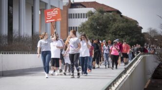 More than 300 people participated in the 4th annual Out of the Darkness walk for suicide prevention at Clemson University March 2, 2019. (Photo by Ken Scar)