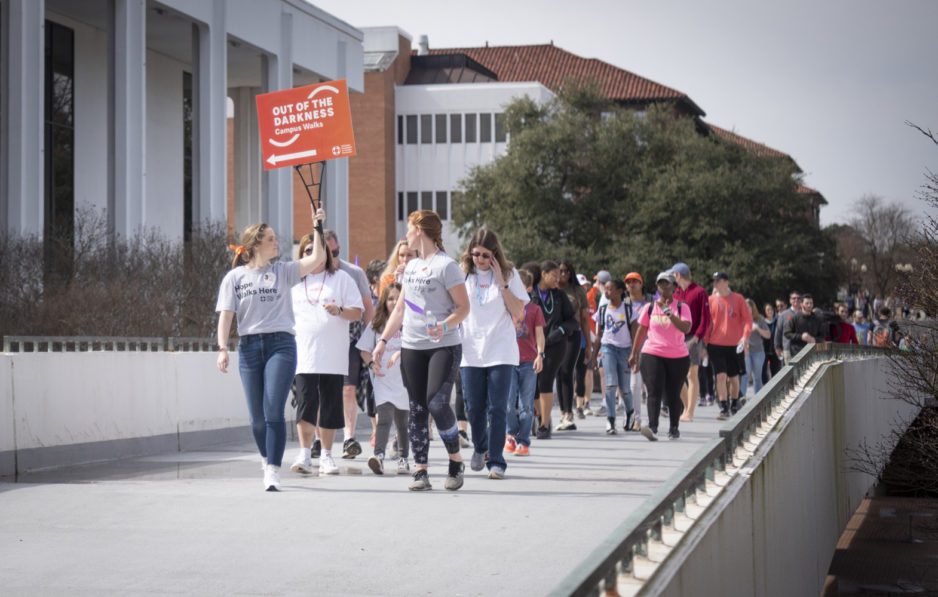 More than 300 people participated in the 4th annual Out of the Darkness walk for suicide prevention at Clemson University March 2, 2019. (Photo by Ken Scar)
