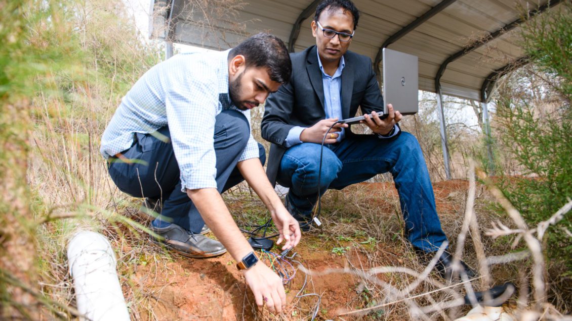 Kalyan Piratla (right) and Ph.D. student Harshit Shukla demonstrate their research at a facility off Hugo Drive about a mile from Clemson University's main campus.