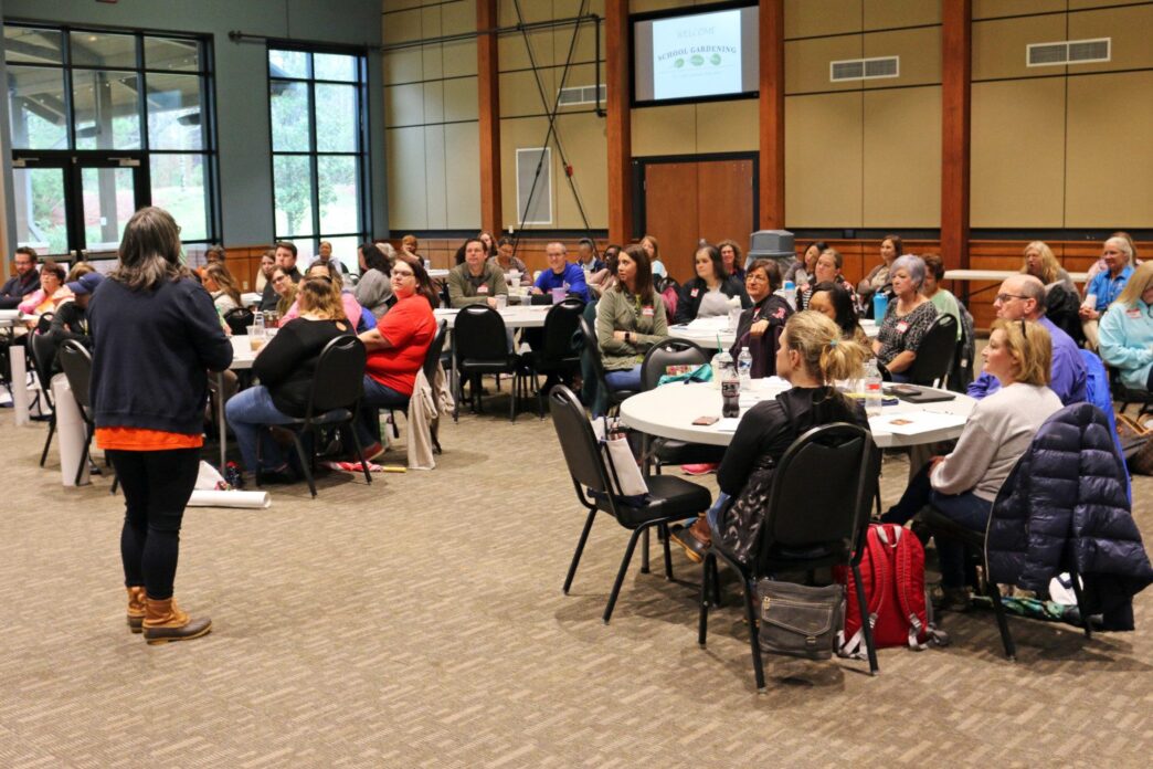 4-H agent addresses teachers during workshop.