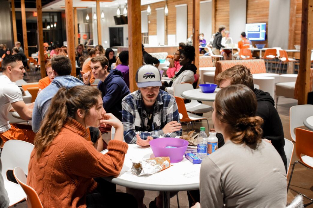 Students take part in a U-NITES! trivia night event in the Barnes Center during the spring semester. On-campus social programming is a major focus of the Center for Student Leadership and Engagement.