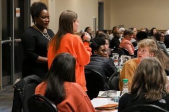 Jil Littlejohn speaks to attendees at the Women's Leadership Conference in March 2020