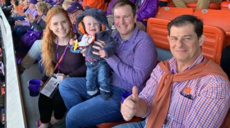 Lagasse family sitting at football game with Garcia