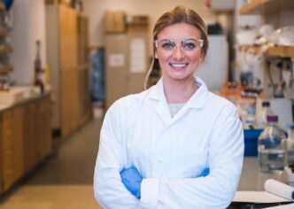 Tatum Sass standing in lab