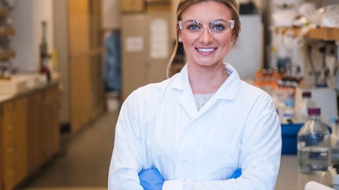 Tatum Sass standing in lab