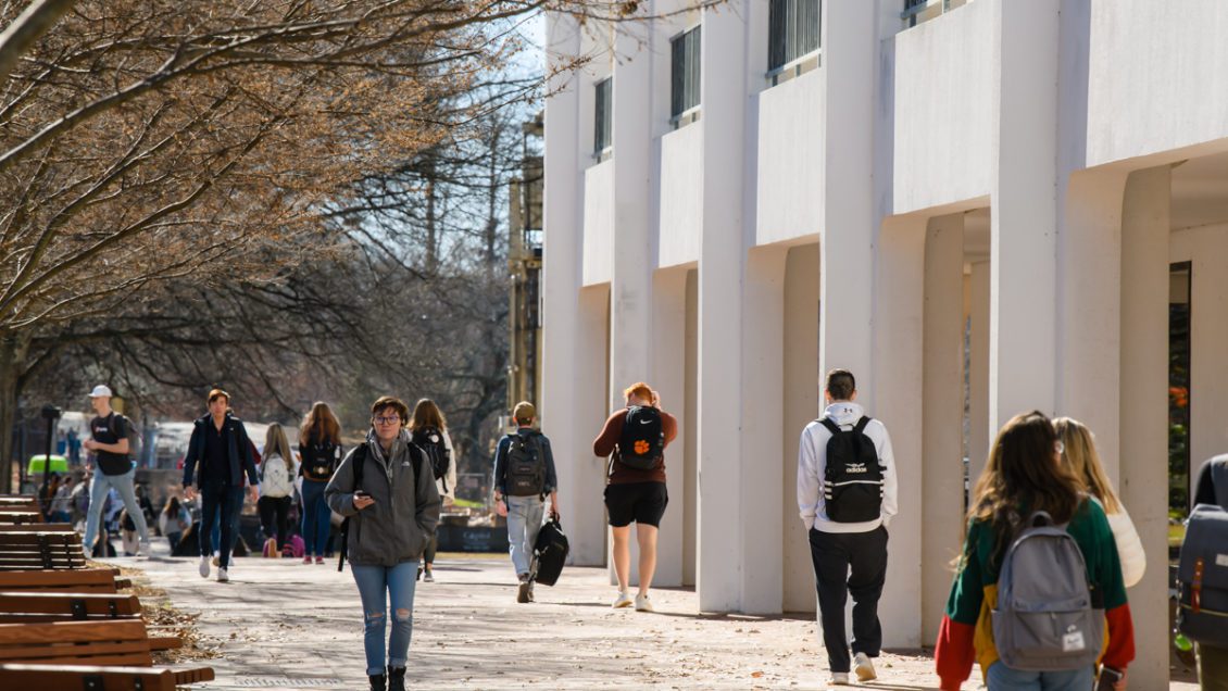 Students walk across Clemson University's campus in January 2020