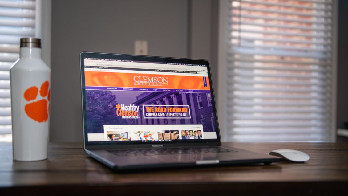 Image of a computer logged on to Clemson's COVID-19 home page