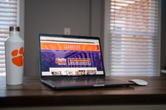 Image of a computer logged on to Clemson's COVID-19 home page