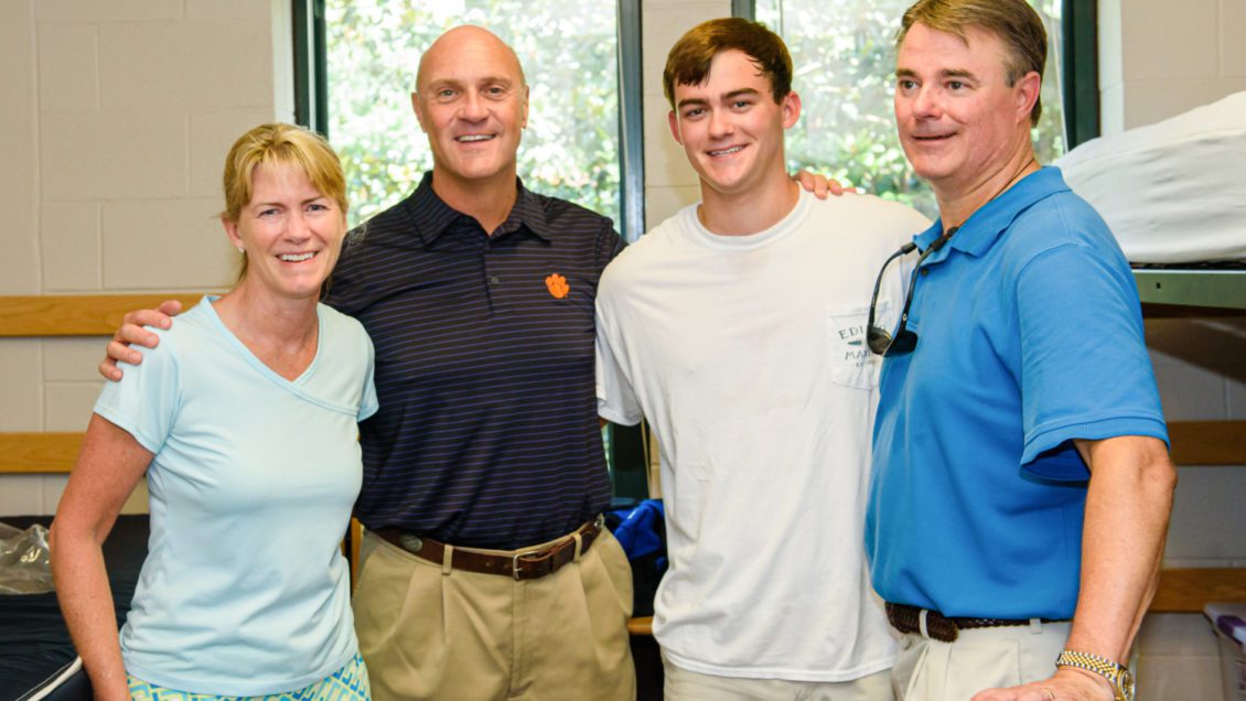 John Gressette, pictured alongside President Jim Clements and his parents from Move-In Day 2017, currently serves as president of the Interfraternity Council at Clemson.
