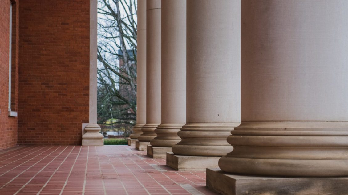 a row of columns in front of a building
