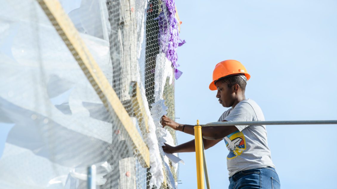 A Clemson student helps prepare a Homecoming float in 2019