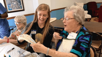 At the IEA Brain Health Club, Clemson students work with participants in a variety of activities, such as music, art therapy and games.