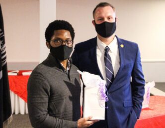 Ty Robinson pictured with Brennan Beck at the 2020 Hail and Farewell student veterans celebration on November 12