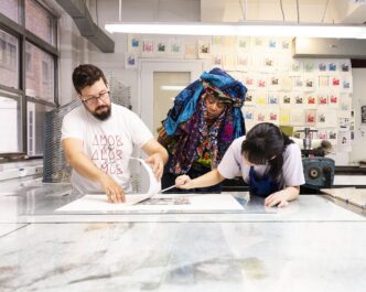 Chakaia Booker and Justin Sanz collaborating on projects