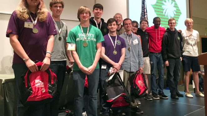 CU Cyber poses with its first-place medals at the Palmetto Cyber Defense Competition. From left to right: Foster McLane, Max Harley, Carson Sallis, Andrew Samuels, Nick Bulischeck, Rusty Cuff, Weston Belk, Nathan Gantt, Kyle Wolfe, Kenneth Simpson, David Houston, Zac Whitworth.