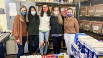 Members of the Homeless Period Project student organization at Clemson donate items to Clemson Community Care