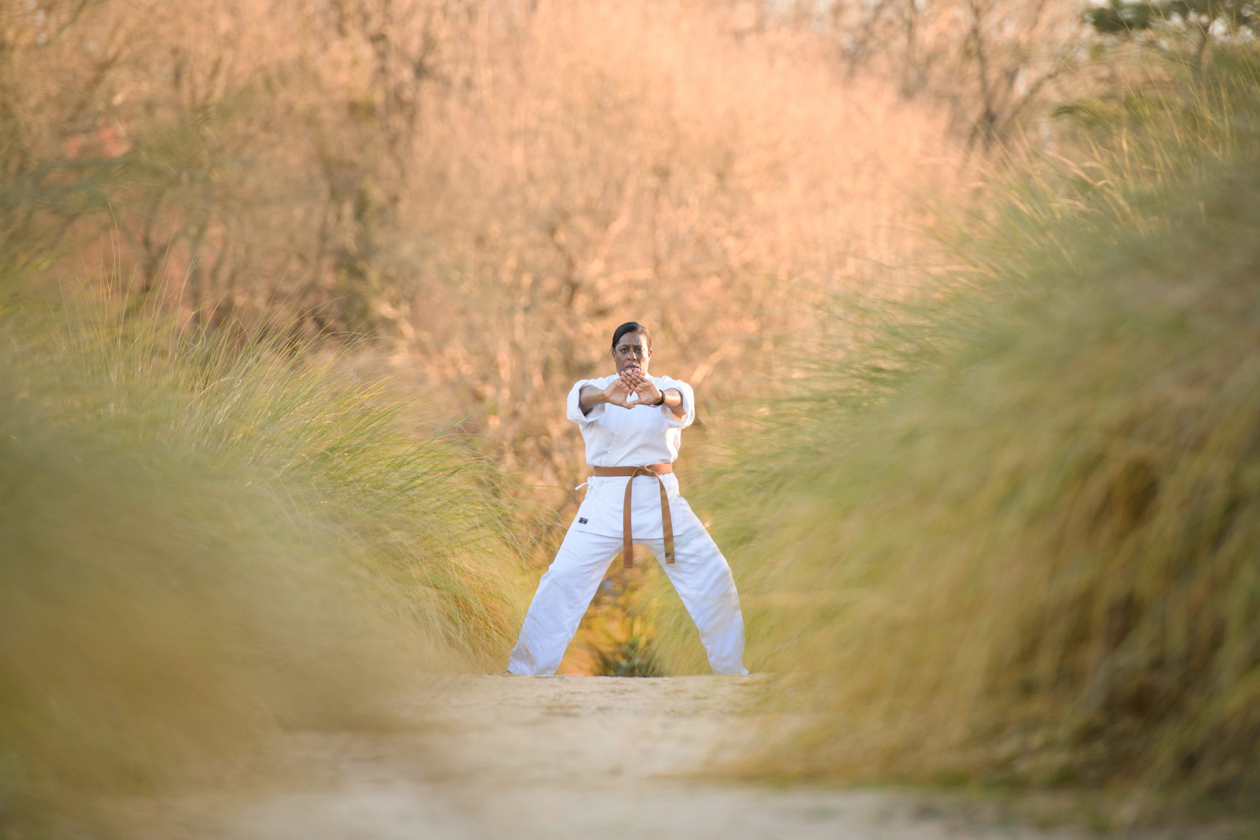 Birma Gainor, interim director of Counseling and Psychological Services (CAPS) for Clemson’s Student Health Services in the Division of Student Affairs, in a martial arts stance