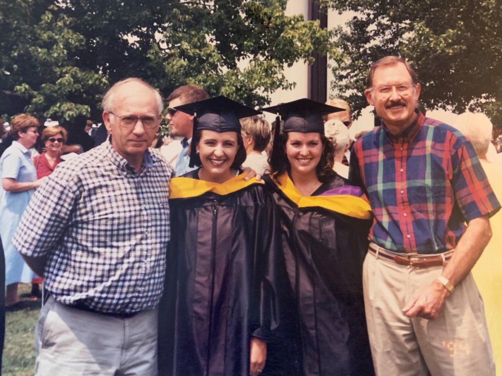 Kellee Melton and Michelle Thorp stand with their major professors, Virgil Quisenberry and Bill Smith, upon graduating with their master's degrees in May 1999.