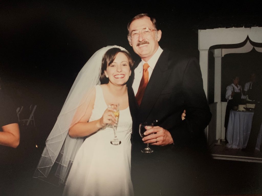 Clemson professor Bill Smith was always involved with his students and celebrated life's happiest moments with them. Here he is shown with Kellee Melton at her wedding.