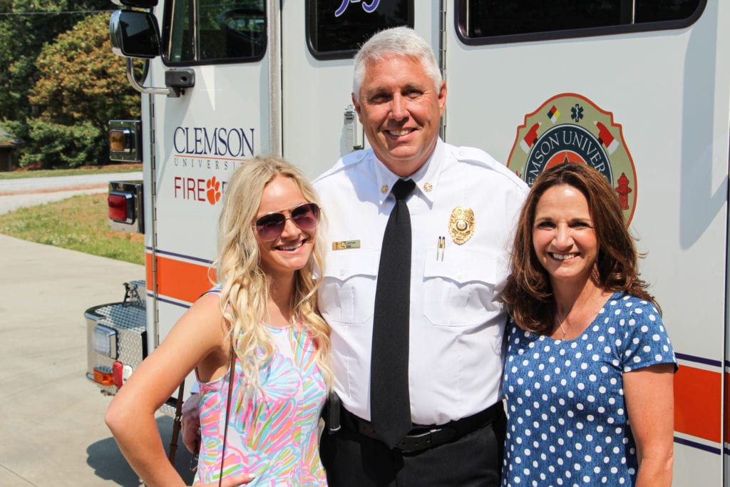 Fire Chief Rick Cramer with his (L-R) daughter Megan and wife Susan during his swear-in ceremony