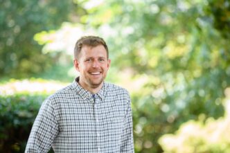 Will Stockton is seen against a natural backdrop.