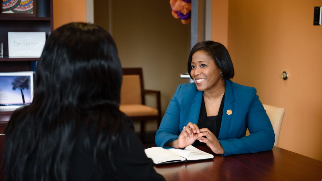 Dr. Kimberly Poole meets with a student