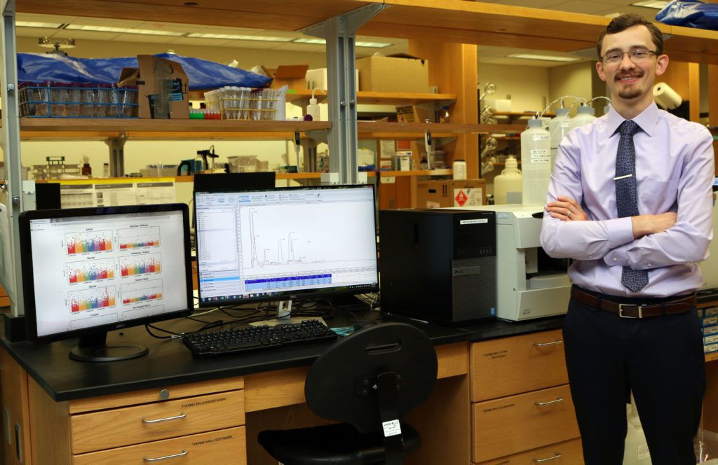Nathan Johnson uses computer programs to study genetic variants of lentils.