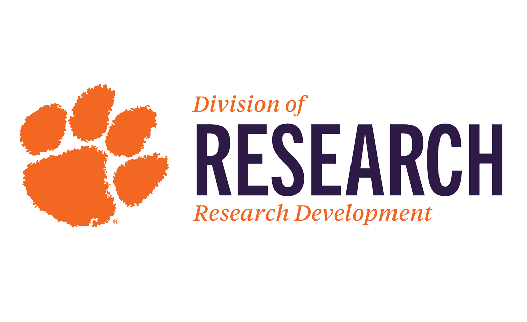 this image includes an orange Clemson tiger paw at the left with the words "Division of Research" written next to it. The words "Research Development" are written under "Division of Research"