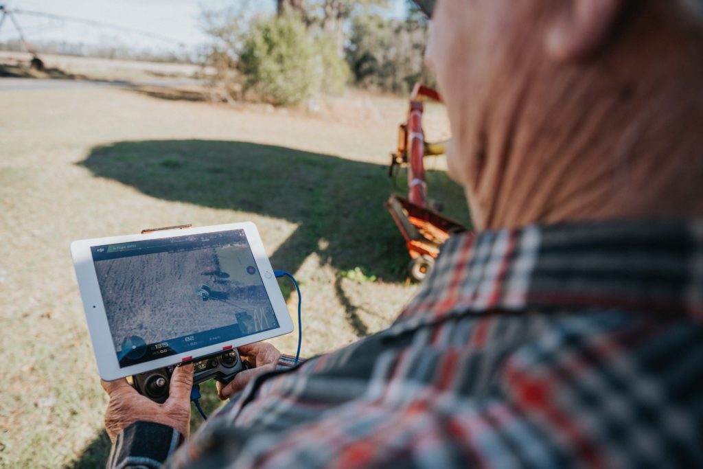 Bamburg County farmer and Clemson alumnus Richard Rentz uses a drone to survey part of his 1,000-acre farmstead.