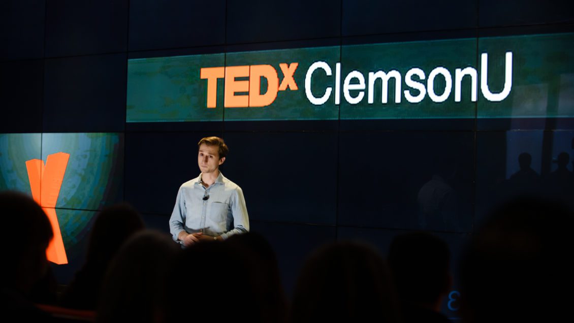 A speaker takes part in a TEDxClemsonU event on main campus