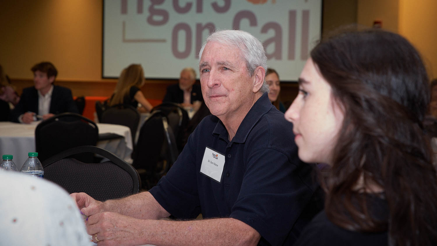 Dr. Sam Stone talks to students interested in health care professions at Tigers on Call at Madren Center.
