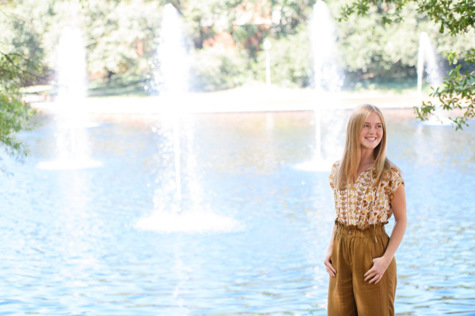 Photo of Natalie Claypool in front of fountains on Clemson's cammpus