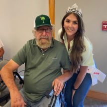 2022 South Carolina Watermelon Queen Samantha Nichols stopped by Edisto REC's watermelon field day last week and posed for a picture with Clemson alumnus Sidi Limehouse, who won first place in a field day's biggest watermelon contest for his entry weighing in at 124 pounds.
