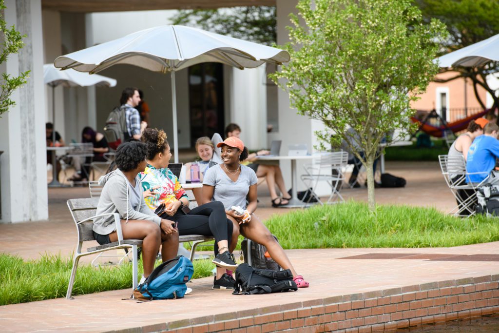 Students conversing on campus