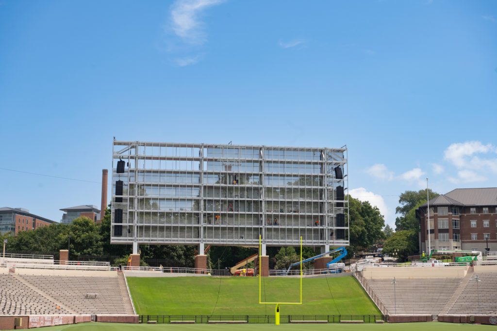 An under-construction video board sits atop the Hill in Memorial Stadium.