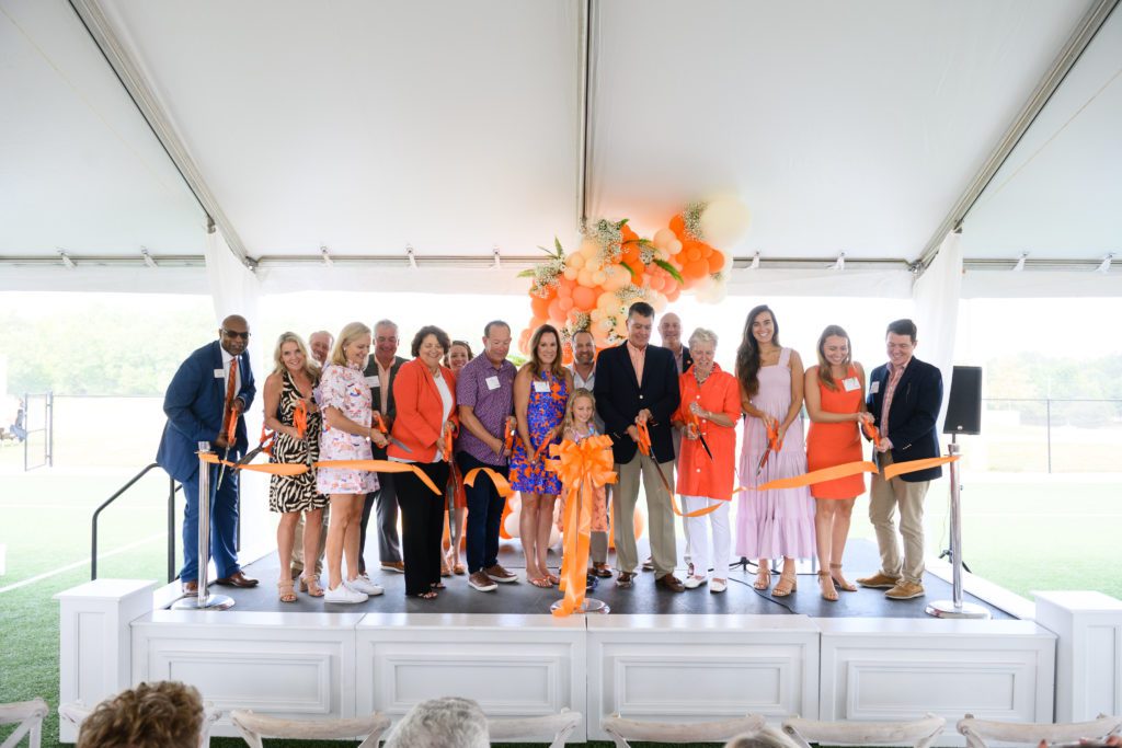 Members of Clemson University administration join the Snow Family and others in a ribbon-cutting ceremony on Sept. 16, 2022