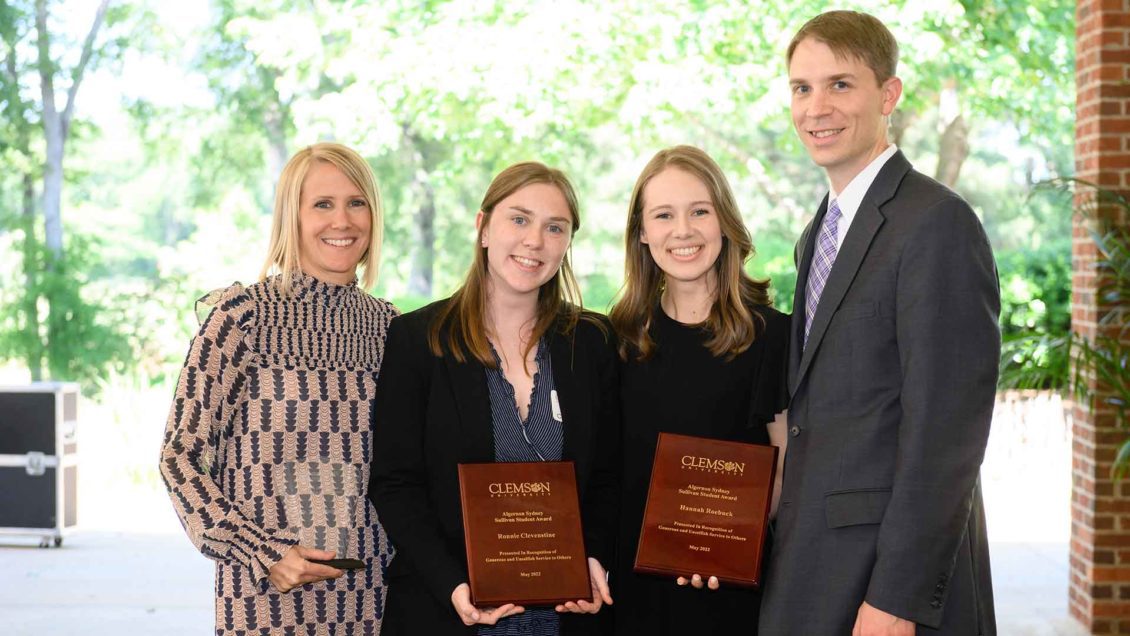 Sarah Winslow with Ronnie Clevenstine, Hannah Roebuck and Jeff Fine posing together at the Clemson University spring awards ceremony for faculty and students.