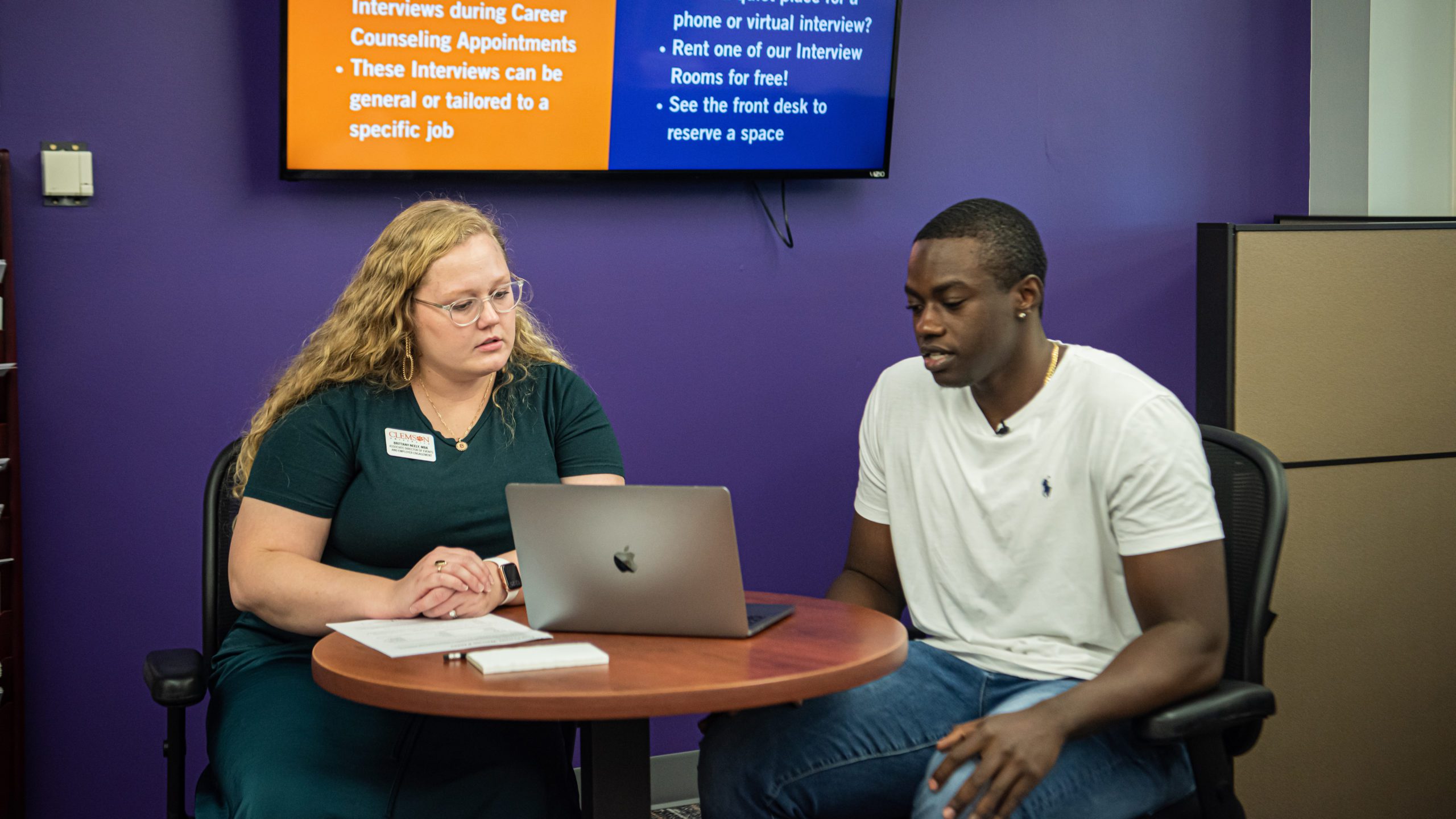 Brittany Neely advises a student during a career counseling session